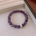 Detailed macro view of purple crystal beaded bracelet with silver zircon-set divider bead - Deep Amethyst Silver Spacer Style (17#)