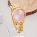 Detail of a Nomination watch with pink dial, gold stainless steel band on a display stand - WT001 Gold Pink Roman