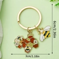Cute golden bee keychain with enamel honeycomb charm for bags and accessory decoration - Honeycomb Flower Decor Style (LS296)