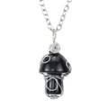 Macro view of hand-woven silver wire wrap on a black agate mushroom pendant necklace - Obsidian