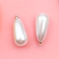 Pair of cream white teardrop imitation pearl pendants with silver metal loop for DIY jewelry - 10x18mm Silver Water Drop