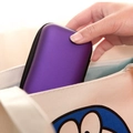 Portable purple electronics organizer case held in hand for mini earbuds and cables - Large / Purple