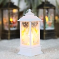 White Christmas lantern featuring angel patterns and warm LED candle light for holiday decor - Small White Angel