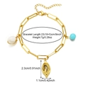 Gold chain bracelet featuring natural white shell and blue bead pendants with size details - Gold Chain With White Shell And Blue Bead