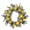 Flocked Christmas wreath with natural pinecones and glowing warm white LED lights - 45cm Flocked Wreath (Lighted)