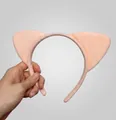 Pink plush cat ear headband made of soft faux fur for festive cosplay costumes - Nude Pink Cat Ears