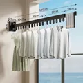 Black 120cm wall-mounted folding clothes drying rack with 18 windproof holes in three-fold design - Black (3-Fold/18 Holes)