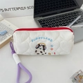 Macro view of the white quilted heart pattern pouch with cute puppy embroidery - White (Dog with Headphones Style)
