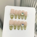 Handmade almond press-on nails with green cat eye gradient and pearl rhinestone accents - XS / Clear Guava Matcha Green Cat Eye (W7-Long Oval)