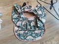 Waterproof baby bib with frilled sleeves and floral print in dark green and pink - Wings - Peony / One Size