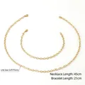 Parure collier et bracelet en acier inoxydable plaqué or 18 carats avec détails de taille - Collier