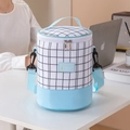 Borsa termica cilindrica con motivo a scacchi bianchi e neri e tracolla azzurra - Blu