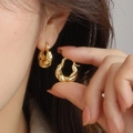Chic gold twisted double layer geometric hoop earrings worn by a model in a close-up - Gold Twisted Minimalist Metal Earrings(ED1982)