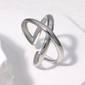 Minimalist silver crossover adjustable titanium steel ring on a white stone background - Adjustable / Steel