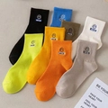 Mid-cut cotton crew socks featuring embroidered smile face and colorful ribbed knit design - Multicolor (NICE Smiley)
