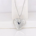 Silver heart-shaped locket necklace with floral engraving and polished metal finish - Convex Wreath Heart/Steel