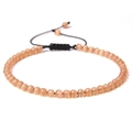Adjustable orange stone bead bracelet with cat eye effect and black braided cord - Orange Cat Eye