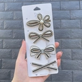 Close-up of four-piece hair clip set with pearls and rhinestones on white card - Diamond Crane (4 Piece Set)