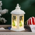 Detail of white Christmas LED lantern showing snowman pattern and warm light setting - White Christmas Tree