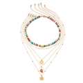 Multi-layer Christmas necklace set with polymer clay beads and golden festive charms - 4-Layer Polymer Clay Pendant Style-5