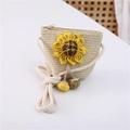 Detail of summer straw crossbody bag featuring yellow sunflower applique and rope strap - Hanging Gourd Style / Beige