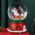 Macro shot of a Christmas crystal ball music box with Santa Claus and a cozy red cottage base - 2022-3 Snowman