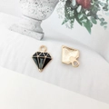 Black enamel diamond-shaped alloy charm with gold border and hanging loop for DIY jewelry - Diamond