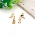 Golden seahorse charms in zinc alloy finish with top hanging loops for DIY jewelry - Seahorse