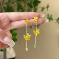 Detail of gold chain earrings with yellow flowers and green rectangle pendants - Gold Chain Yellow Flower Green Rectangular Pendant (7997)
