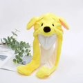 Detail of yellow plush dog hat with long movable ears on a white mannequin head - Yellow Dog