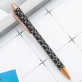 Ballpoint pen with black body and golden crackle pattern featuring rose gold metal accents - Water Drop Black (Rose Gold Trim)