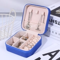 Portable blue jewelry travel box with pink velvet lining and organized compartments - Sapphire Blue