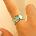 Bague ouverte dorée avec fleur en émail bleu et incrustations de nacre pour femme - Fleur en Émail Spirale Bleue (10650)