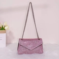 Pink rhinestone envelope clutch with silver chain strap on soft white plush rug - Style 4 Pink