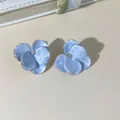 Macro detail of light blue floral earrings with silver plating and zircon center - Light Blue 3D Artistic Flower (4681)