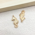 Golden seahorse charms with detailed texture and attachment rings for DIY jewelry making - 1pc Seahorse Charm