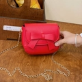 Cute red mini princess crossbody bag with a large bow and gold metal chain strap - Red