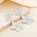Detailed view of silver flower earrings with pleated texture and five-petal metal design - Silver Mixed Size Floral Set (KE114498-KFC)
