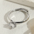 Adjustable silver ring with brilliant-cut round zircon in classic four-prong setting - Round / Adjustable / White Gold Plated Round Zircon