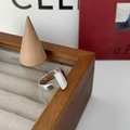 Polished silver wide open ring in minimalist twist style on a wooden jewelry tray - Wide Polished Open Ring (J2525)