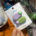 Close-up of purple and green fabric hair clips with bead accents on display card - Green Purple Round Bead Purple Green Drop Duckbill Clip Set
