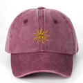 Vintage burgundy washed cotton baseball cap featuring a yellow sun embroidery on the front - Burgundy