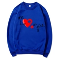 Royal blue crewneck sweatshirt featuring a heart and puzzle pattern on the chest - Blue 312