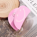 Pink smiley face acrylic hair claw clip with glossy finish on a wooden background - Pink Smiley Face (D2-4-17)