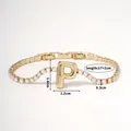 Luxury gold-plated bracelet featuring a crystal-set letter P pendant and zircon chain - Letter P