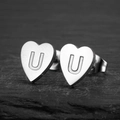 Polished heart-shaped stainless steel stud earrings featuring engraved letter U - Letter U / Steel