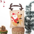 Christmas gift bag with Santa and reindeer embroidery featuring brown antler handles - Santa Claus