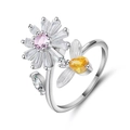 Detailed close-up of rotating silver daisy ring with pink stones and bee accent - Bee Daisy - Pink Zirconia