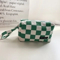 Close-up of green checkered canvas pouch with metal zipper and merciparis label - Green Checkerboard Large