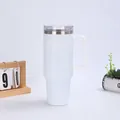 White 40oz stainless steel vacuum tumbler with handle on a minimalist white desk setup - White (Generation 1)